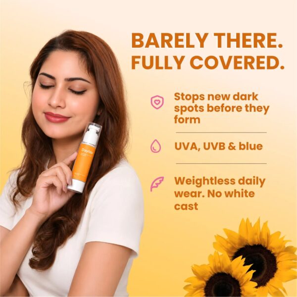 Woman holding Daylite sunscreen — stops new dark spots forming, screens UVA, UVB and blue light, and wears weightless with no white cast