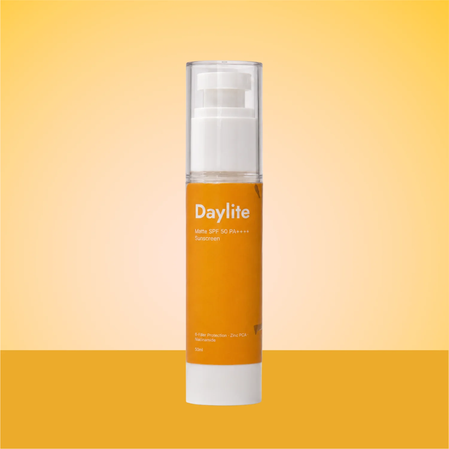 Daylite SPF 50+ PA++++ sunscreen in an orange 50ml pump bottle on a yellow background