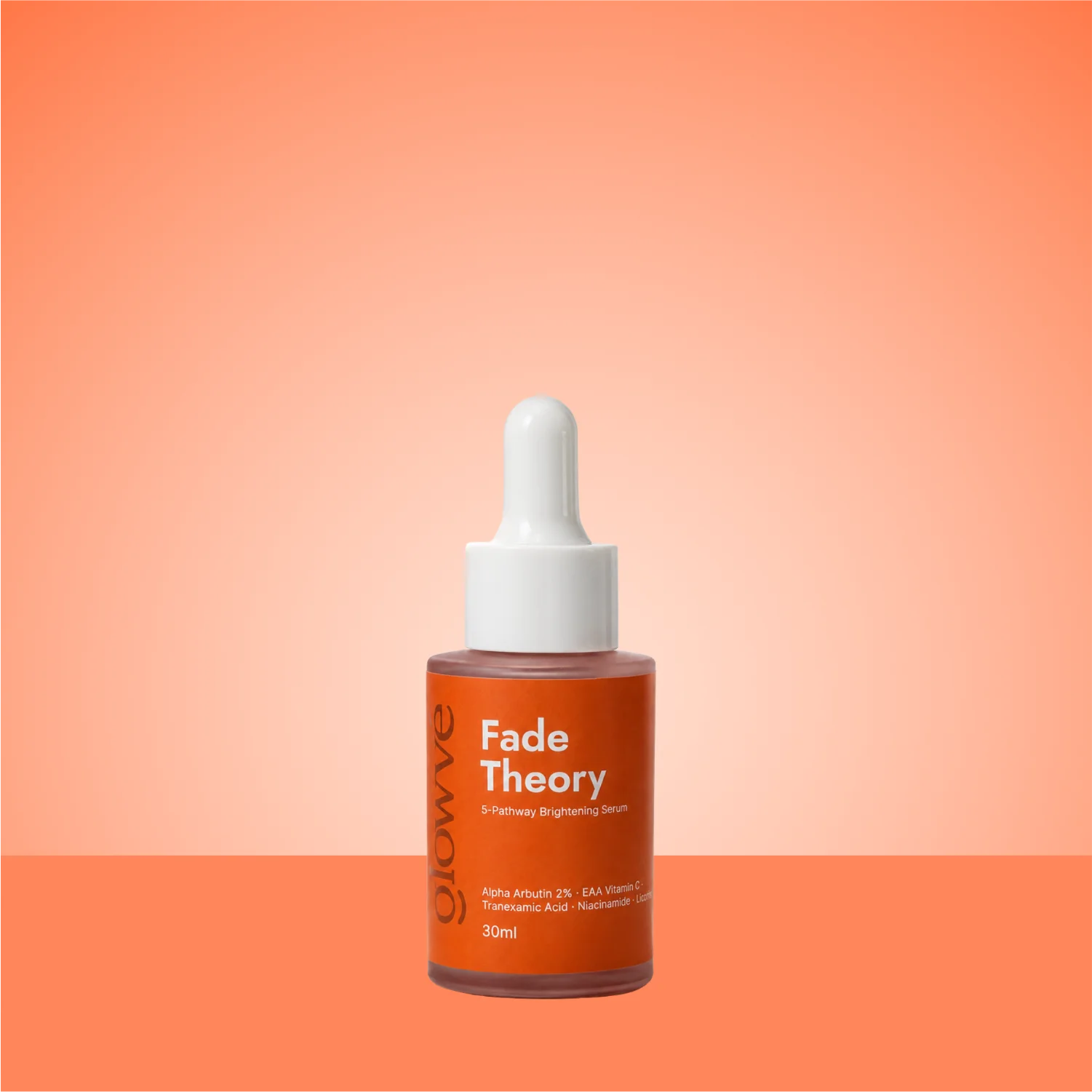 Fade Theory dark spot serum in a 30ml amber dropper bottle on an orange background