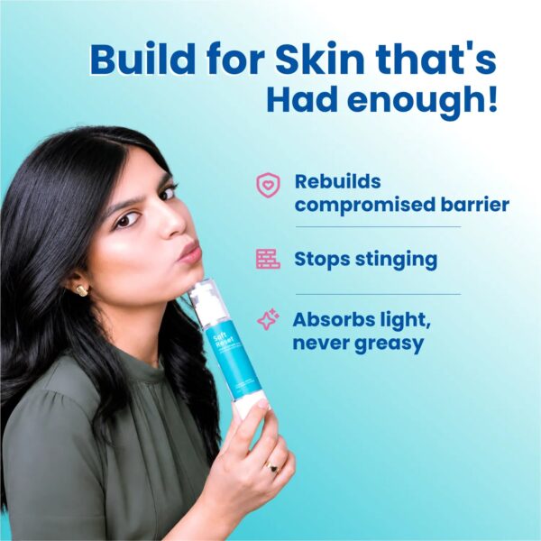 Woman holding Soft Reset moisturiser — rebuilds a compromised barrier, stops stinging, and absorbs light without feeling greasy