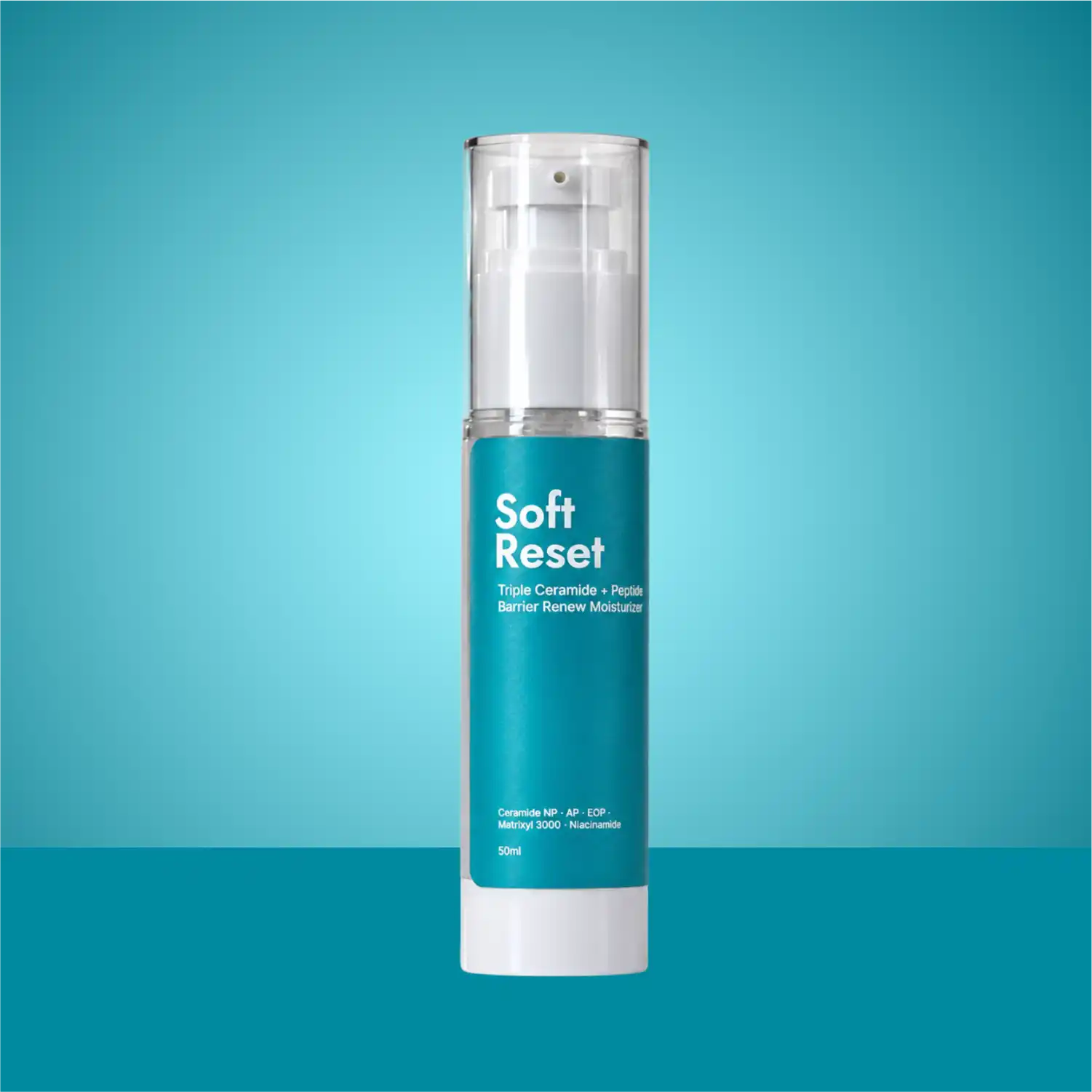 Soft Reset ceramide barrier repair moisturiser in a teal 50ml pump bottle on a blue background